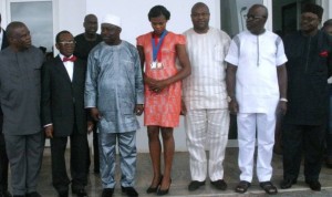  from left; President, Athletics Federation of Nigeria, Chief Solomon Ogba, Prof. Amos Utuama, Deputy Governor of Delta State, Governor Emmanuel Uduaghan of Delta State, Blessing Okagbera, Rt. Hon. Speaker, DTHA, Victor Ochie, Chairman, Delta State Sports Commission, Mr. Amaju Pinnic and Director General, Delta State Sports Commission, Mr. Victor Onogagamue during a State reception in her honor following her brilliant performance at the 2013 World Athletics Championship in Moscow, in Government House, Asaba, Friday.  