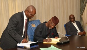 Imoke signing the 2014 Cross River State Appropriation Bill