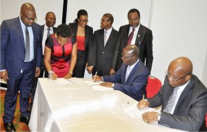 Managing Director, Shell Petroleum Development Company Nigeria Ltd. and Country Chair, Shell Companies in Nigeria, Mr. Mutiu Sunmonu (right); CEO, GE International Operations Nig., Mr. Lazarus Angbazo (second right); and others, at the signing of the Shell-funded N1billion Oloibiri, Bayelsa State Health Project in commemoration of Nigeria’s Centenary in Lagos… last Wednesday.