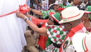  The First Lady,Dame Patience Jonathan flanked by wife of Cross River Gov., Mrs. Obioma Liyel Imoke and Gov. Liyel Imoke of Cross River,(Left) and wife of Akwa Ibom Gov., Mrs. Ekaette  Akpabio cutting tape to commission the 6,000 capacity stadium in Ikom, Cross River ahead of the PDP National Women Rally in Ikom Wednesday, 25/2/15