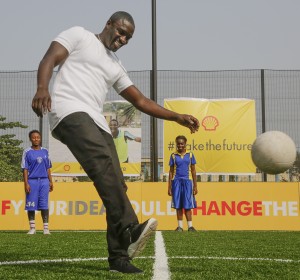 Akon plays football on the new pitch