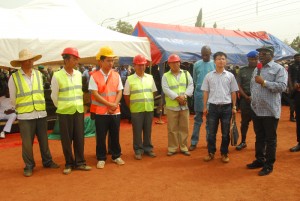 Governor of Ebonyi State, Engr. David Umahi(right) with officials of China Zunghaoi Ltd at the flagging off the construction of the Hilltop Nwofe Road in Abakaliki on Thursday. 