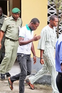 Yunusa Dahiru (Right) stepping out of the Federal High Court earlier today  