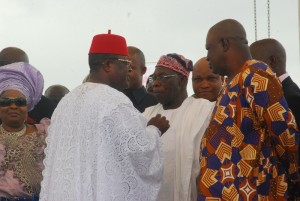 Governor David Umahi of Ebonyi State chatting with Former President, Olusegun Obasanjo (centre), during the burial of the mother of the governor in Uburu on Friday. With them are wife of former President Goodluck Jonathan, Patience; and former SGF, Sen. Anyim Pius Anyim. Photo: EBSG
