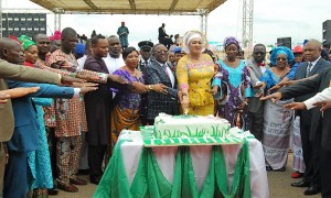 Ebonyi State Governor, Engr. David Umahi (in eye glasses); his wife, Rachel (yellow attire); and other stakeholders of the state during the 2016 Democracy Day Celebration and one anniversary of the Umahi administration at the Abakaliki Township Stadium on Sunday. Photo: EBSG