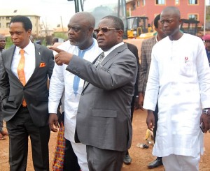 Governor David Umahi of Ebonyi State(in eye glasses);  Pastor Peter Oyeyemi of Christ Embassy 2, Abakaliki; Commissioner for Lands and Housing, Sunday Inyima and   the governor's ADC, Jonathan Bawada, while inspecting a scene of flood disaster in Abakaliki ...on Sunday. Photo: EBSG