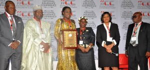 The Minister of Finance, Mrs. Kemi Adeosun (3rd left) holding a plague presented to her at the National Insurance Conference 2016, in Abuja, Monday. To her right are Commissioner for Insurance, Alhaji Mohammed Kari and Chairman , the Nigerian Insurers Association, Mr. Eddie Efekoha. To the Minister’s left are Chairman, National Insurance Conference Planning Committee, Mrs Yetunde Ilori; President, Chartered Insurance Institute of Nigeria, Lady Isioma Chukwuma and President, Institute of Loss Adjusters of Nigeria, Mr. Ralph Opara.