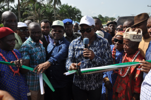 Governor David Umahi of Ebonyi State(3rd left) and House of Representatives member, Idu Igariwey with traditional rulers as well as offcials of Afikpo South Development Centre during the commissioning of new bridges in Amangwu-Edda on Tuesday.