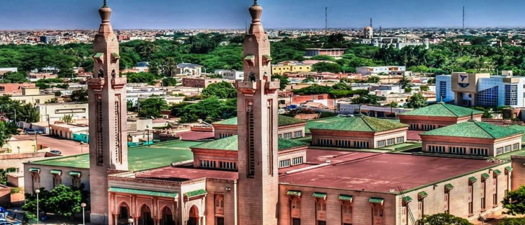 How urbanization and climate change exacerbate the risk of flooding in Mauritania, according to the World Bank