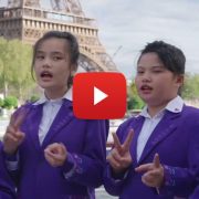 Children from Wuzhishan, Hainan Sings on the Seine in Paris during the opening performance of the Sino-French Gourmet Carnival